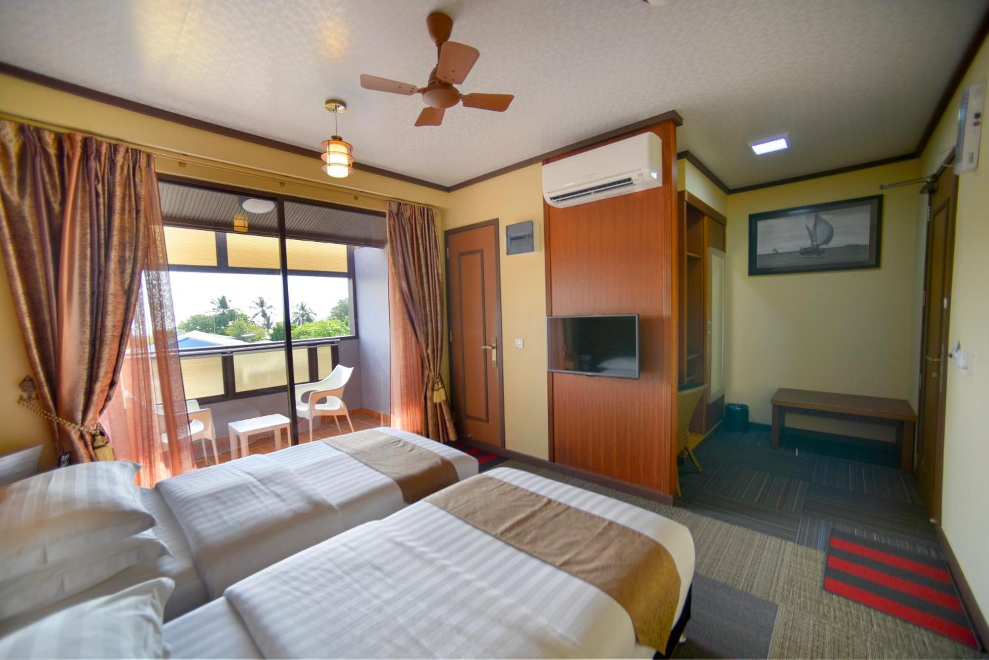 Hotel Rashu Hiyaa Dhiffushi Habitación foto