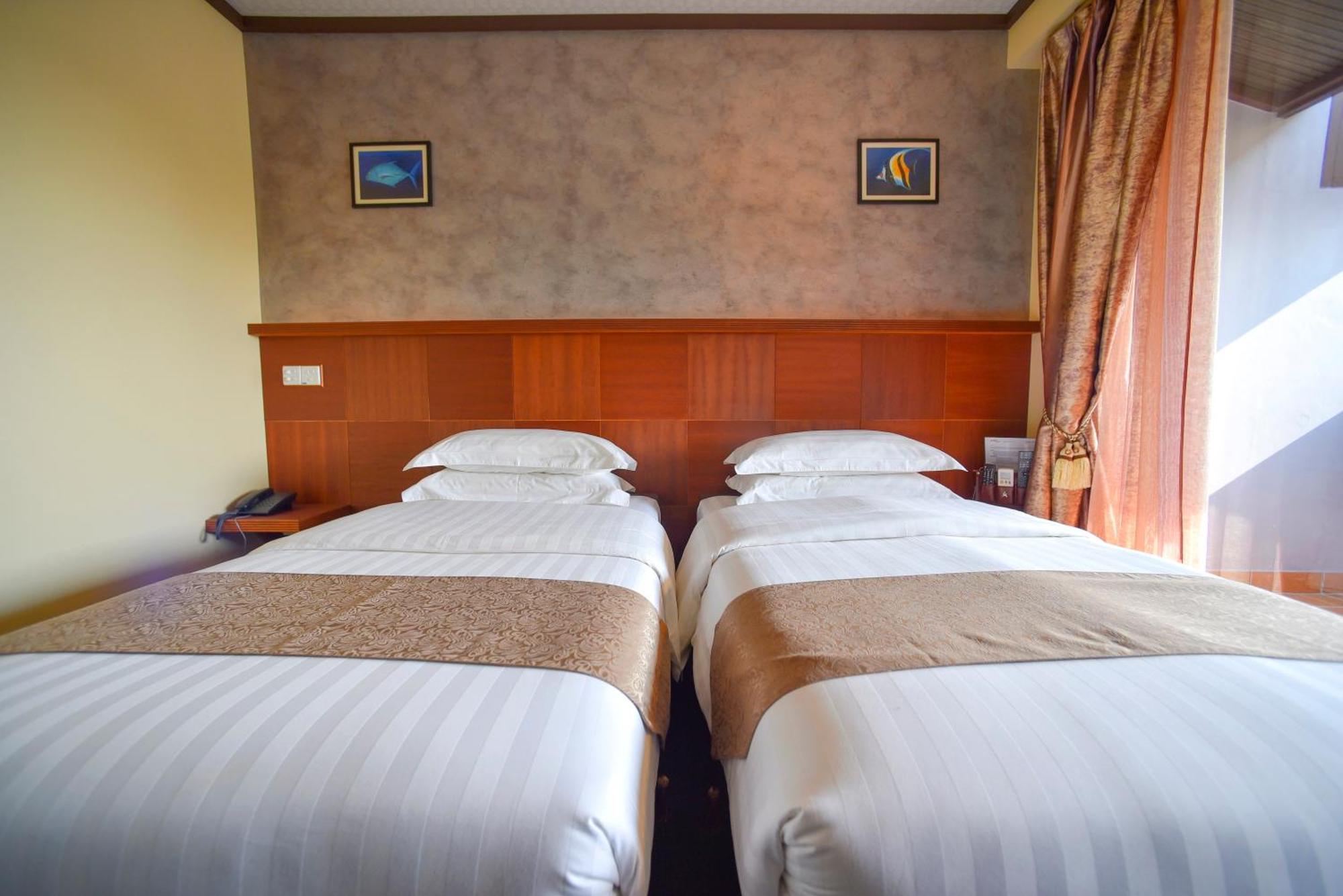 Hotel Rashu Hiyaa Dhiffushi Habitación foto